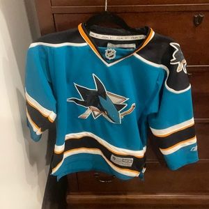 A San Jose Sharks Hockey Jersey. Youth L/XL boys